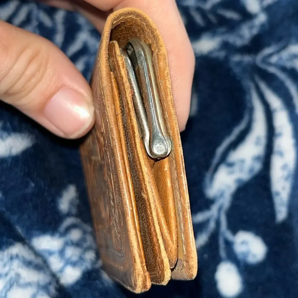 1898 Antique hand-tooled Leather billfold wallet featuring a floral pattern